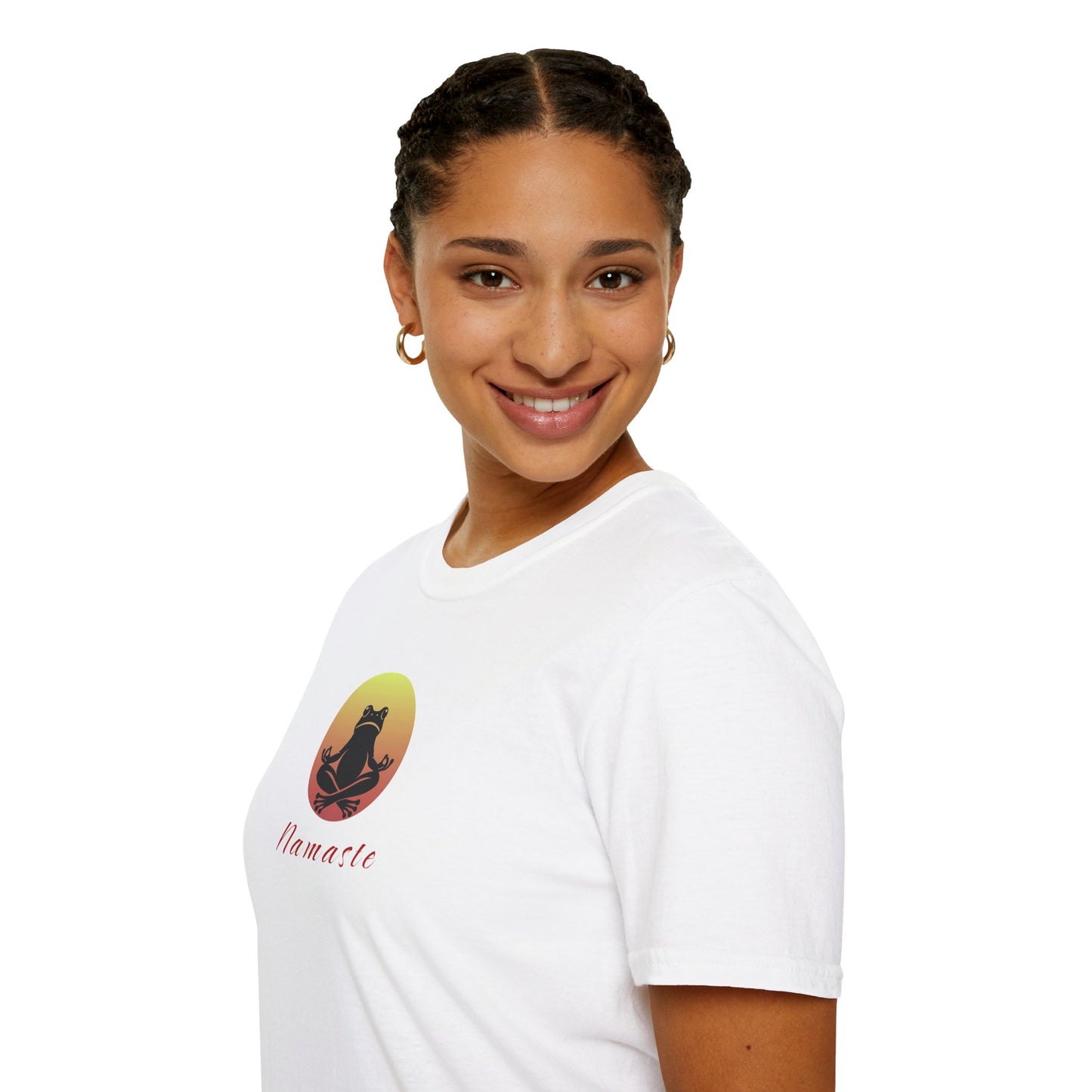 a woman wearing a white colored T-shirt featuring a relaxed frog in a peaceful yoga pose, ideal for self-care enthusiasts and mindfulness lovers. This zen-inspired shirt offers comfort and calm for yoga practice or everyday wear