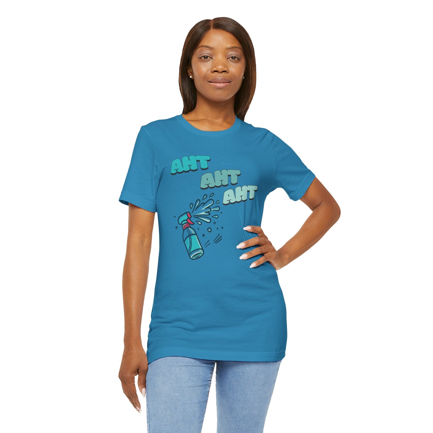 a woman wearing a spray bottle shooting three squirts of water, each squirt accompanied by the playful text 'Aht Aht Aht.' The design is printed on a aqua T-shirt, adding a humorous and cheeky vibe, perfect for warding off unwanted behavior with a lighthearted message.