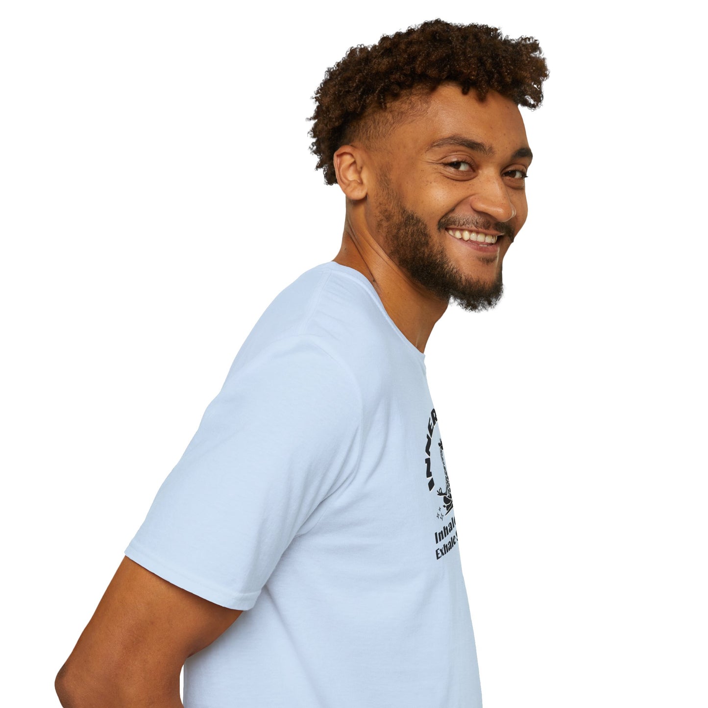 a man wearing a light blue colored t-shirt with image of a giraffe in a zen position with the text surrounding image, inner peace, inhale clam exhale strengths.