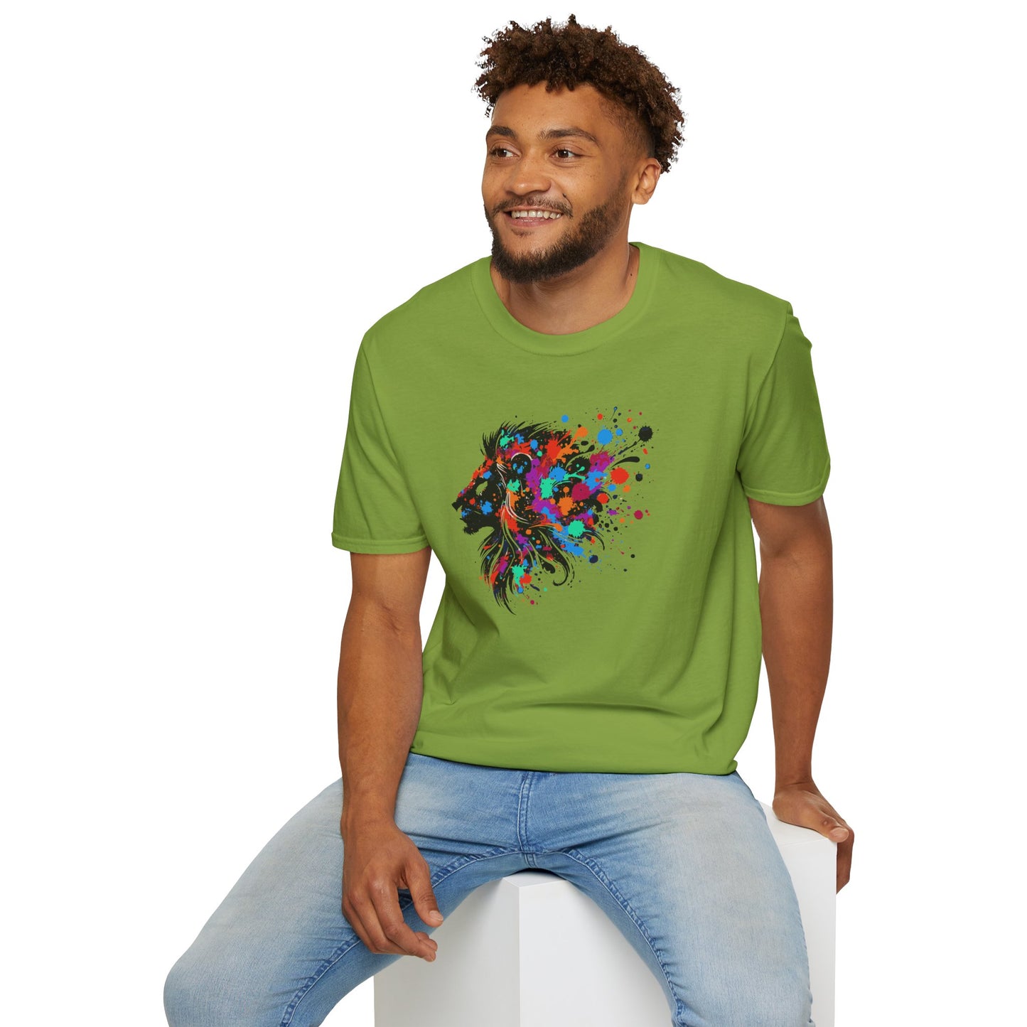 a man wearing a kiwi colored tshirt background featuring a vibrant ink splatter forming the side profile of a lion's head, showcasing bold colors and dynamic artistic detail.
