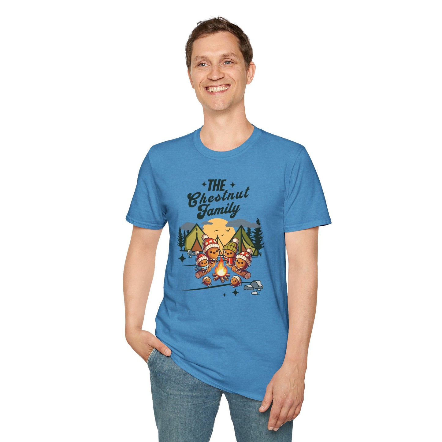 a man wearing a heather sapphire colored t-shirt with an image of a cartoon family of chestnuts sitting by an open fire at a campsite