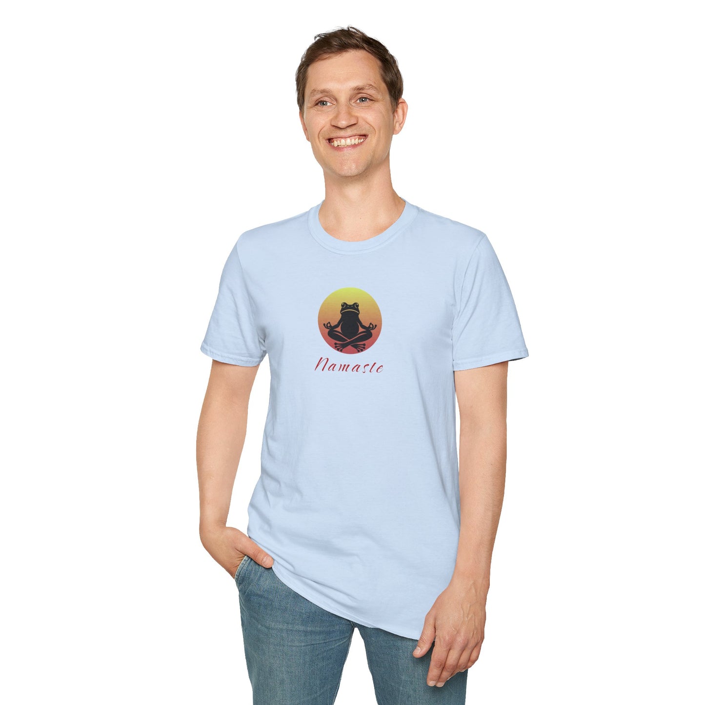 A man wearing a light blue colored T-shirt featuring a relaxed frog in a peaceful yoga pose, ideal for self-care enthusiasts and mindfulness lovers. This zen-inspired shirt offers comfort and calm for yoga practice or everyday wear