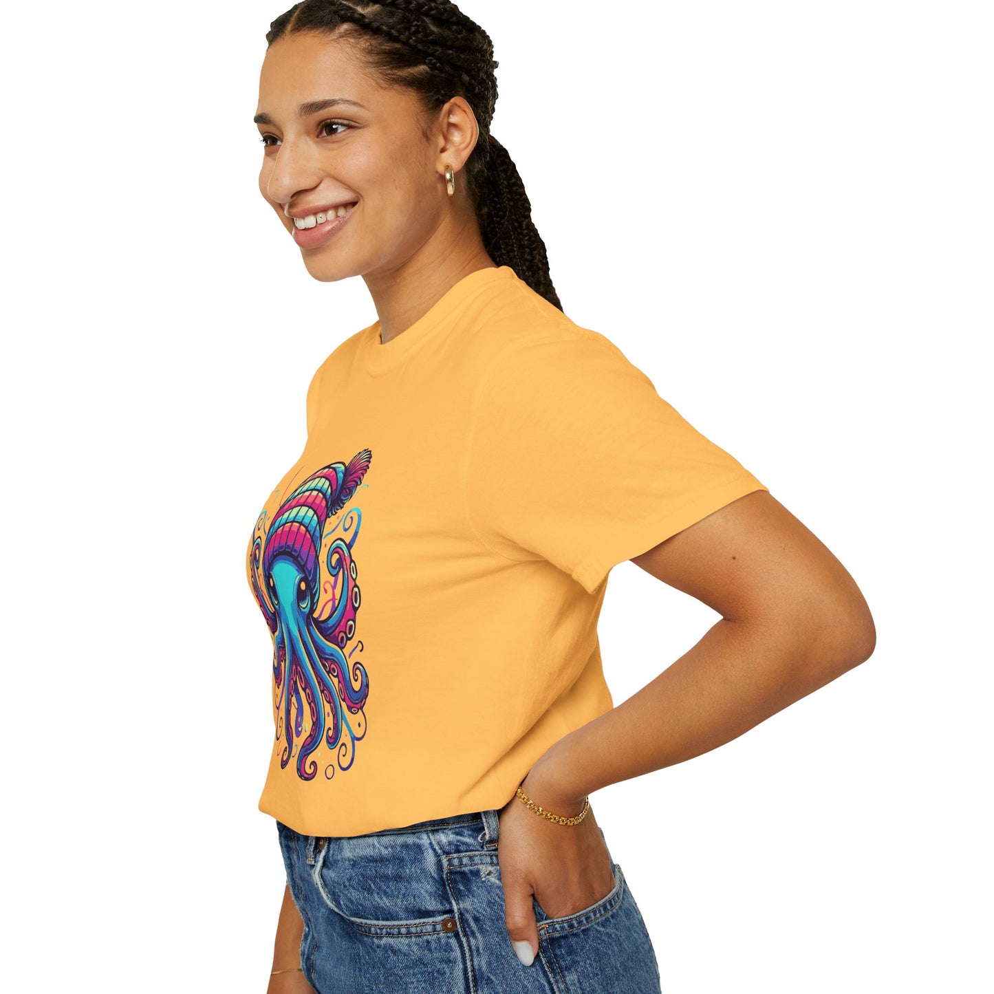 a woman wearing a citrus colored t-shirt with an image of jewel-toned Octopus wearing a knit cap
