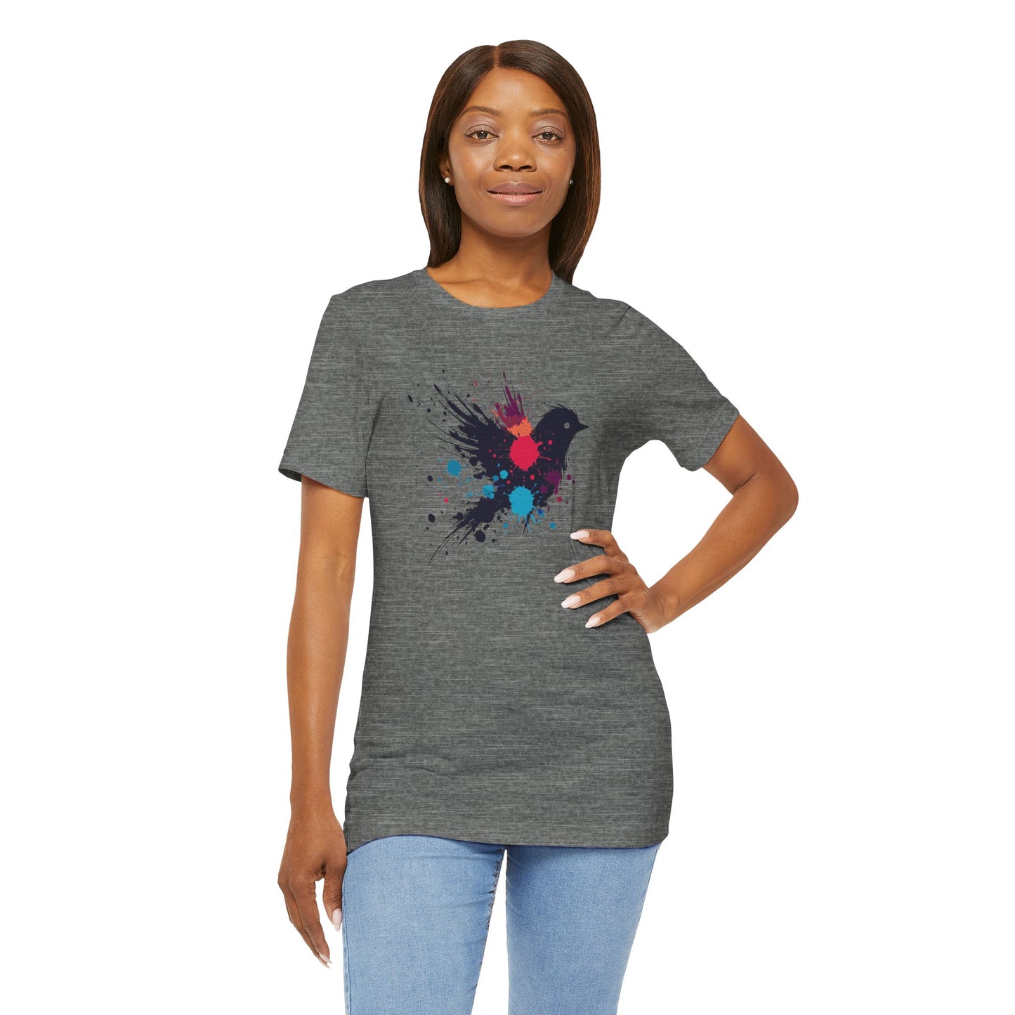 a woman wearing a deep heather color t-shirt with an image of blue red and orange paint splatter bird