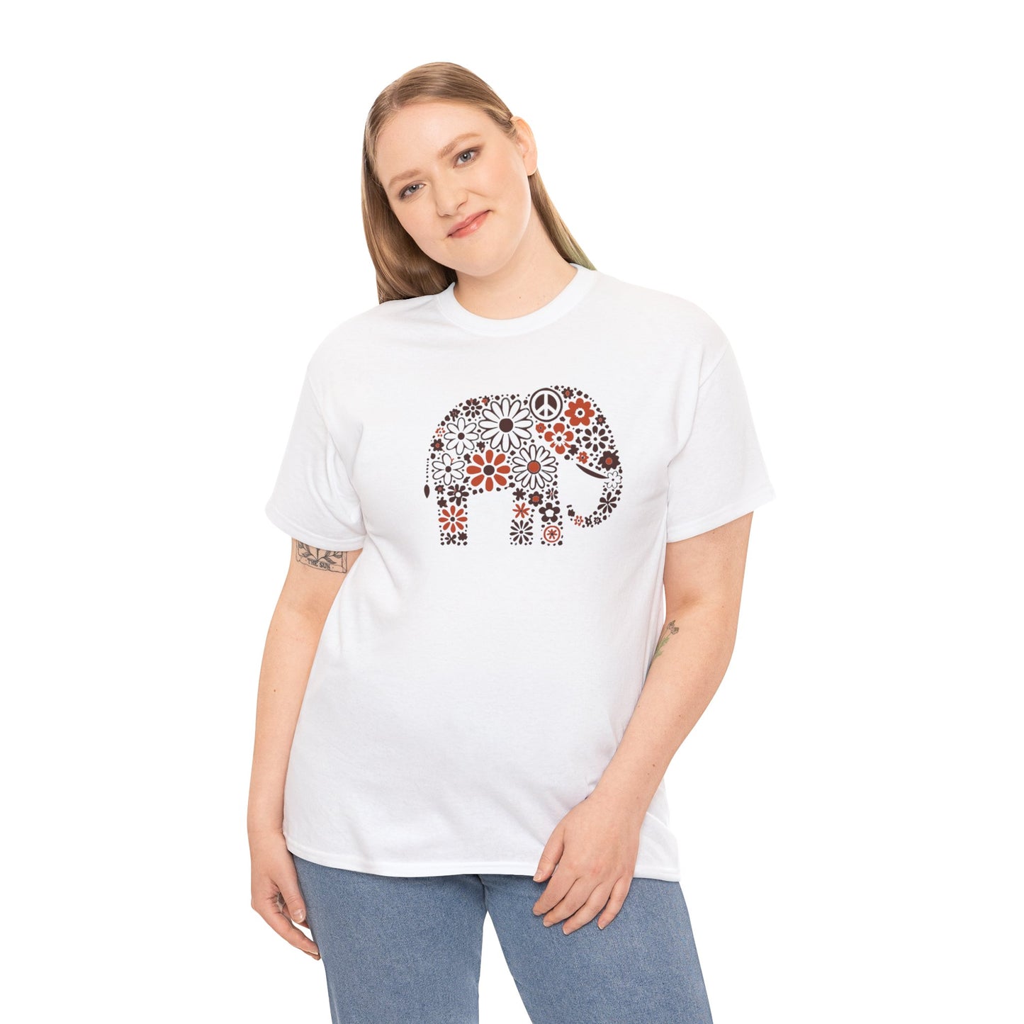 a woman wearing a white color t-shirt with an image of an elephant created out of brown and orange floral design