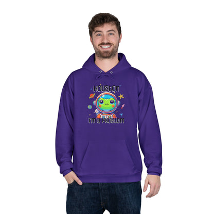 a man wearing a purple colored hoodie with graphic of a cute astronaut frog in a spacesuit, ready for an interstellar adventure. The design showcases the frog as a space cadet, radiating charm and joy, perfect for spreading smiles across the galaxy