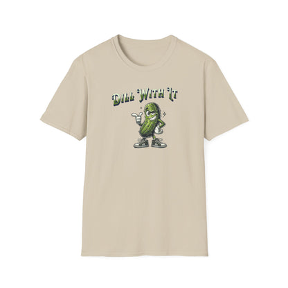 A sand colored t-shirt featuring a snarky pickle with a smirking expression, accompanied by the text 'Dill with it.' The pickle exudes cool confidence, perfect for those who embrace their individuality and unbothered attitude.