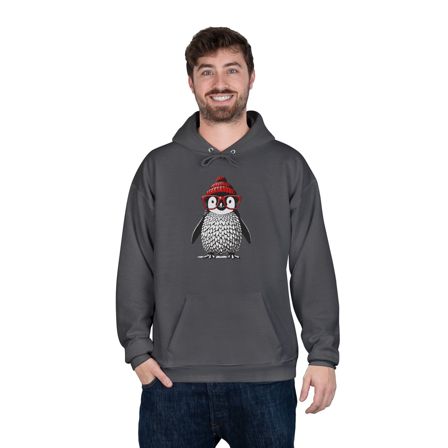 a man wearing a smoke grey colored hoodie with an image of a penguin wearing a red beanie and red eyeglasses