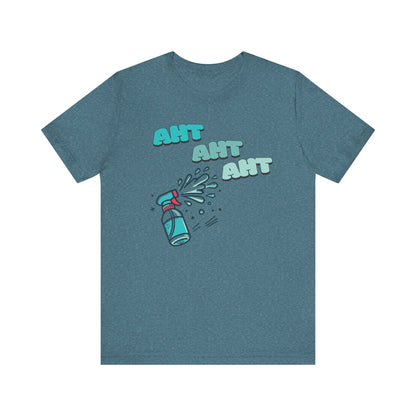 A spray bottle shooting three squirts of water, each squirt accompanied by the playful text 'Aht Aht Aht.' The design is printed on a heather deep teal T-shirt, adding a humorous and cheeky vibe, perfect for warding off unwanted behavior with a lighthearted message.