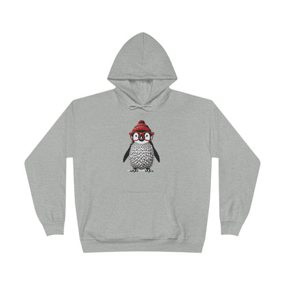 a light steel colored hoodie with an image of a penguin wearing a red beanie and red eyeglasses