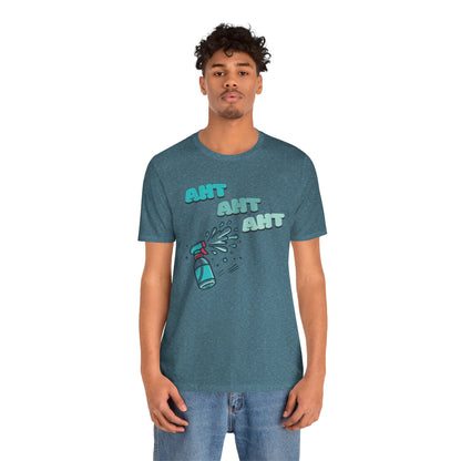 a man wearing a spray bottle shooting three squirts of water, each squirt accompanied by the playful text 'Aht Aht Aht.' The design is printed on a heather deep teal T-shirt, adding a humorous and cheeky vibe, perfect for warding off unwanted behavior with a lighthearted message.