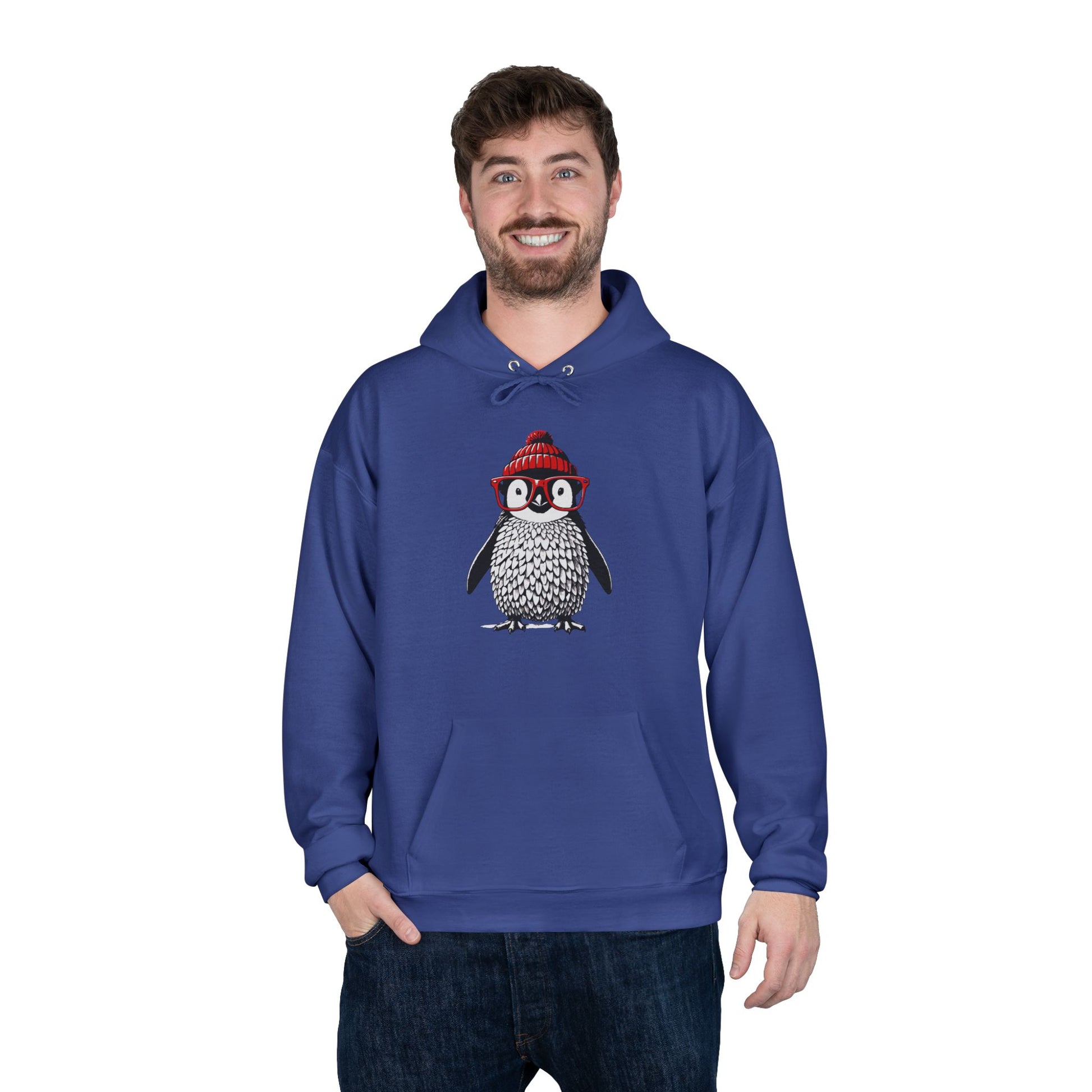 a man wearing a royal blue colored hoodie with an image of a penguin wearing a red beanie and red eyeglasses