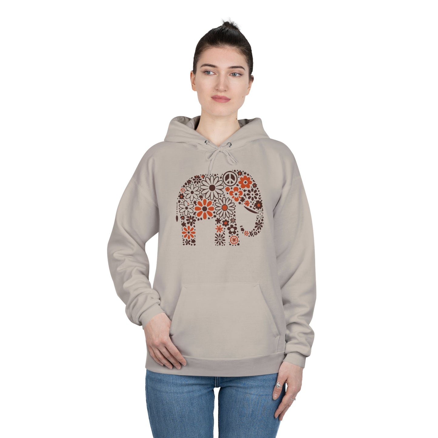 a woman wearing sand color hoodie with an image of an elephant created out of brown and orange floral design