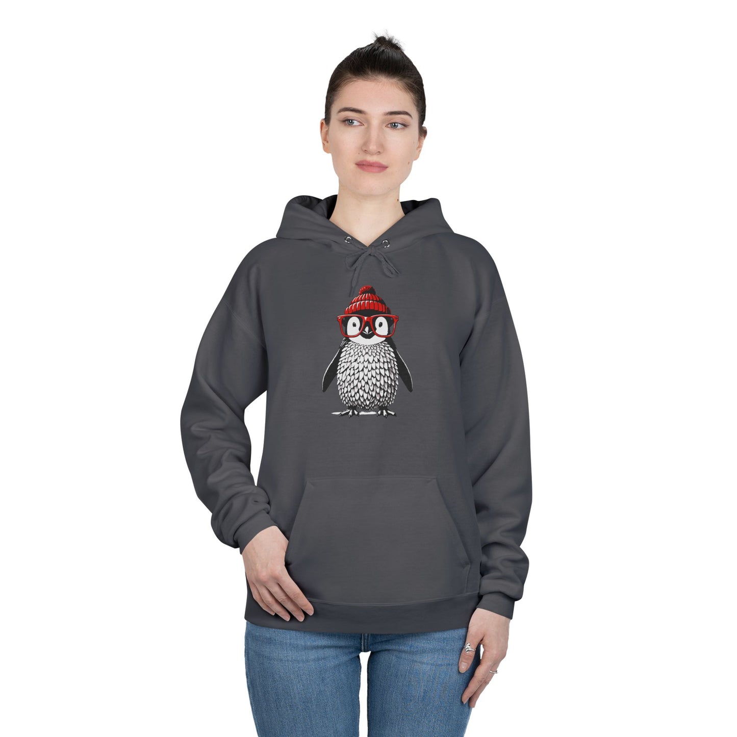 a woman wearing smoke grey colored hoodie with an image of a penguin wearing a red beanie and red eyeglasses