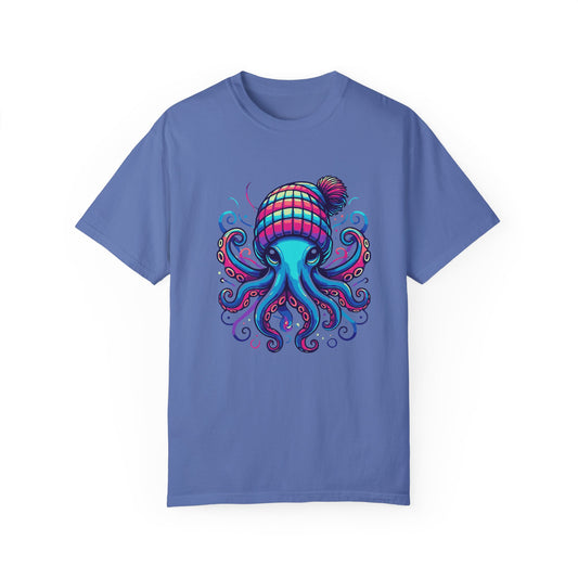 a mystic blue colored t-shirt with an image of jewel-toned Octopus wearing a knit cap