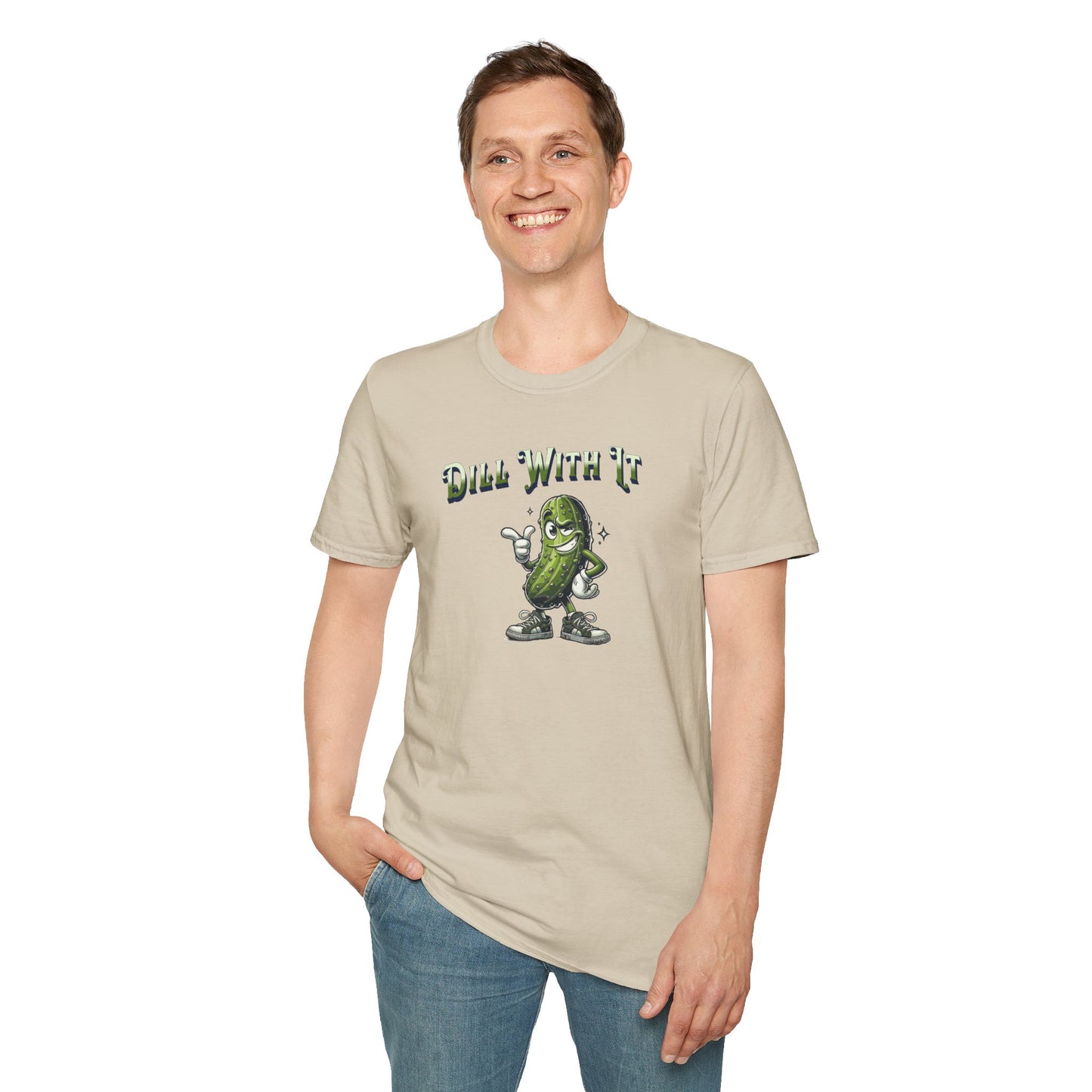 a man wearing a sand colored t-shirt featuring a snarky pickle with a smirking expression, accompanied by the text 'Dill with it.' The pickle exudes cool confidence, perfect for those who embrace their individuality and unbothered attitude.