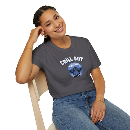 a woman wearing a charcoal color t-shirt featuring a relaxed penguin in a calm yoga pose, set against serene blue waters, snowy peaks, and gentle snowflakes. Perfect for promoting relaxation and cozy, laid-back vibes.