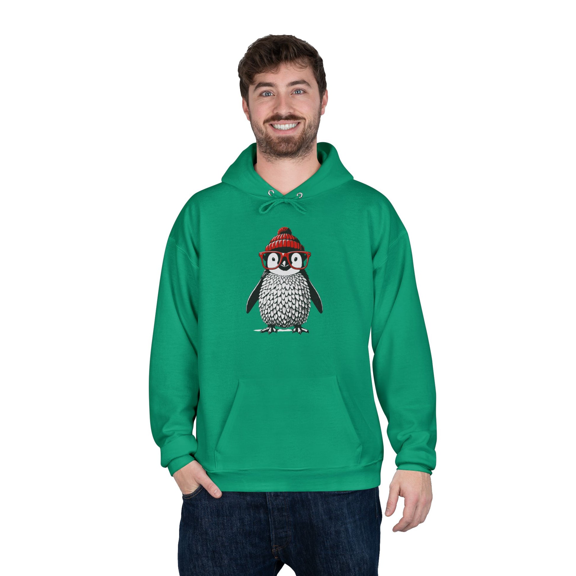 a man wearing a kelly green colored hoodie with an image of a penguin wearing a red beanie and red eyeglasses