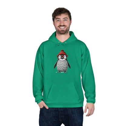 a man wearing a kelly green colored hoodie with an image of a penguin wearing a red beanie and red eyeglasses