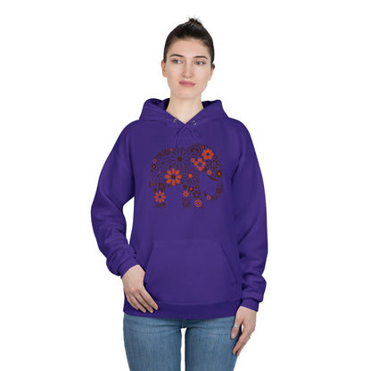 a woman wearing a purple color hoodie with an image of an elephant created out of brown and orange floral design