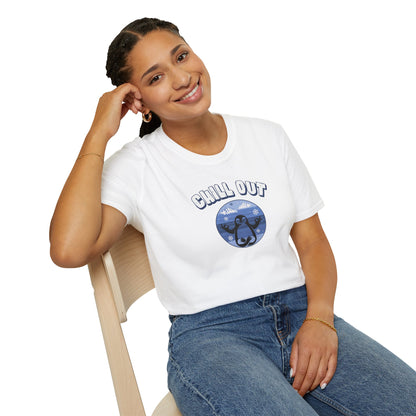 a woman wearing a white t-shirt featuring a relaxed penguin in a calm yoga pose, set against serene blue waters, snowy peaks, and gentle snowflakes. Perfect for promoting relaxation and cozy, laid-back vibes.