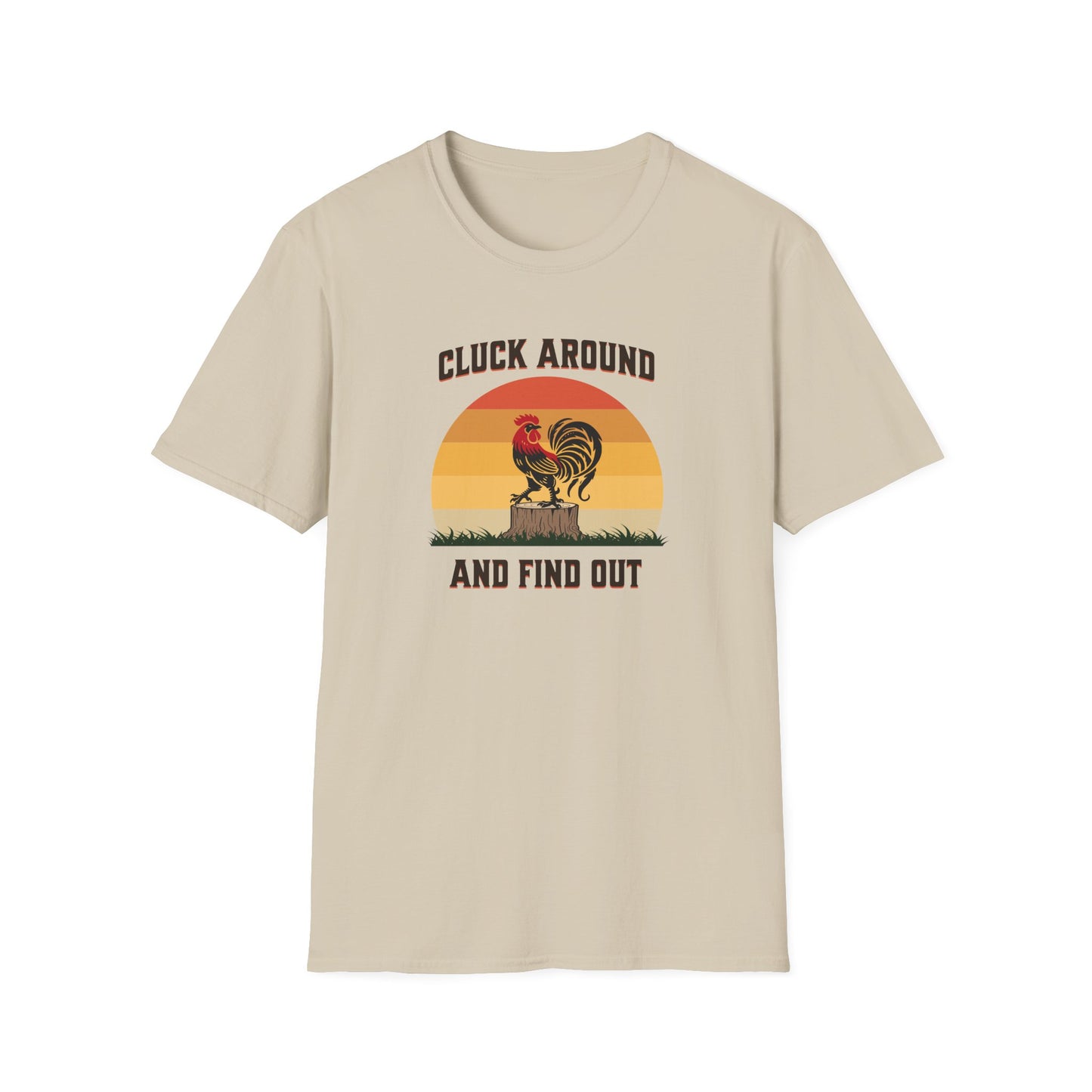 Sand colored t-shirt featuring a red and black rooster standing on a brown tree stump on green grass, set against a retro red-to-orange sunset background with the text 'Cluck Around and Find Out'.