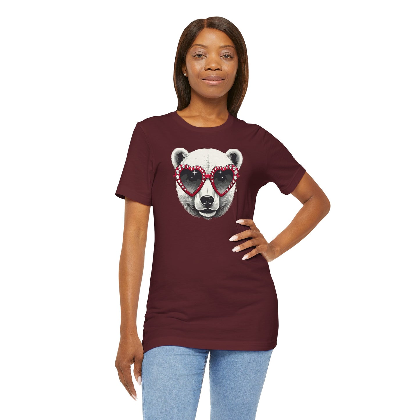 a woman wearing a maroon color t-shirt with a white polar bear face wearing a a heart-shaped sunglasses 