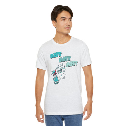 A spray bottle shooting three squirts of water, each squirt accompanied by the playful text 'Aht Aht Aht.' The design is printed on a ash T-shirt, adding a humorous and cheeky vibe, perfect for warding off unwanted behavior with a lighthearted message.