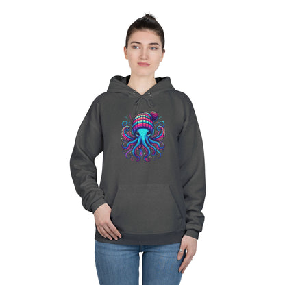 a woman wearing a charcoal heather colored hoodie with an image of jewel-toned octopus wearing a knit cap