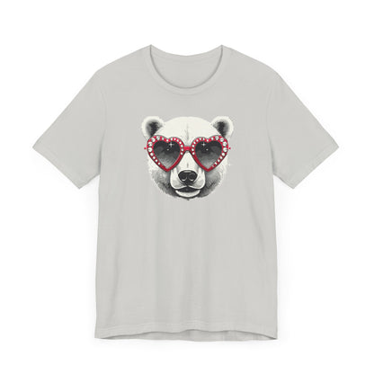 a silver color t-shirt with a white polar bear face wearing a a heart-shaped sunglasses 