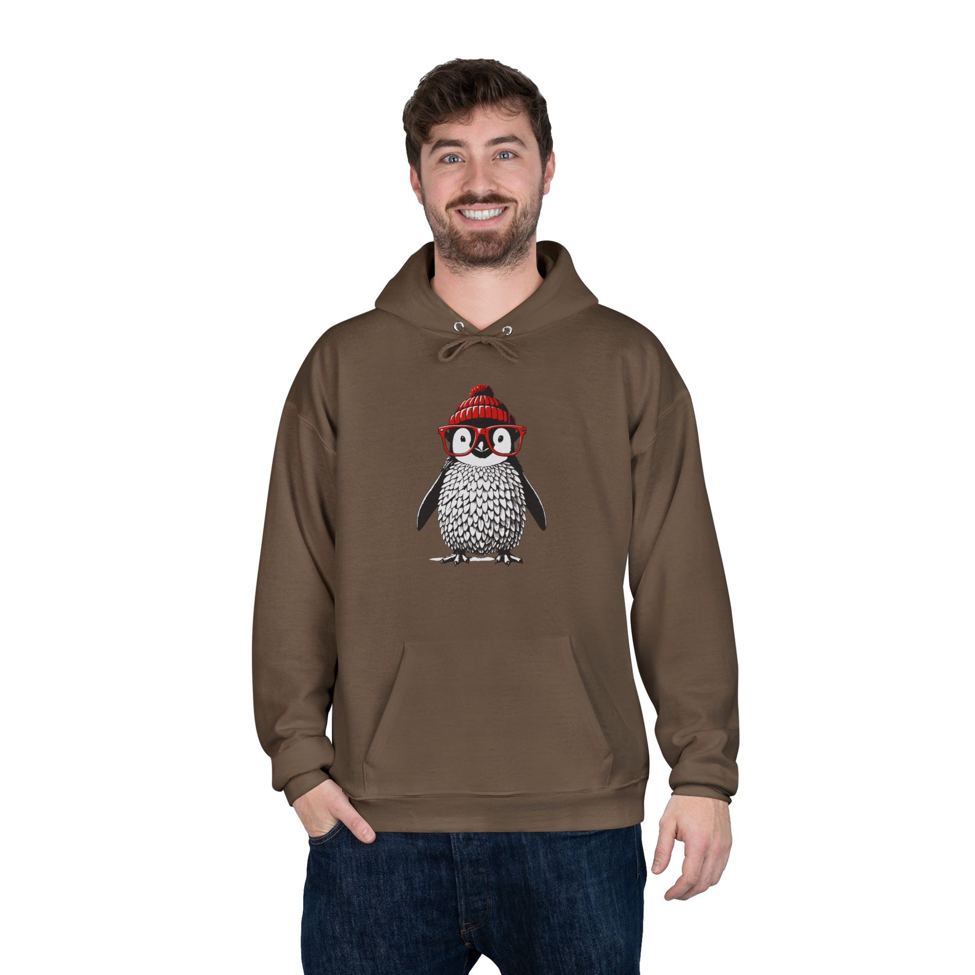 a man wearing an army brown colored hoodie with an image of a penguin wearing a red beanie and red eyeglasses