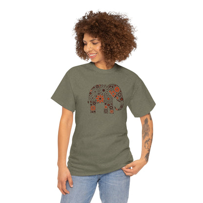 a woman wearing a  heather military green color t-shirt with an image of an elephant created out of brown and orange floral design